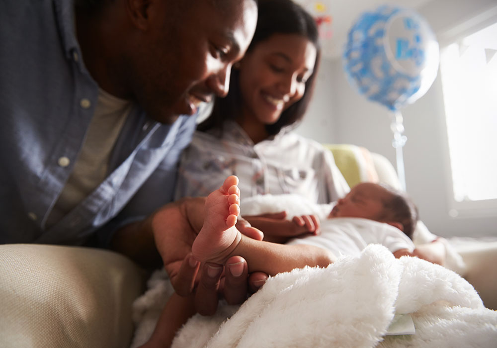 Parents with newborn baby