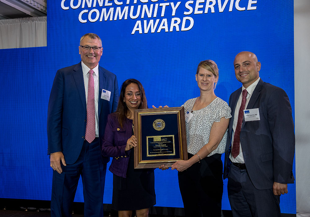 Norwalk Hospital outreach program staff celebrated with an award